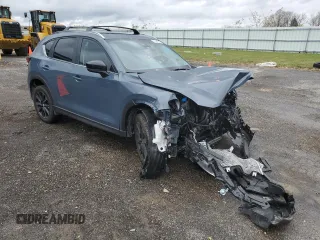 2024 Mazda CX-5 S Carbon Edition with VIN JM3KFBCL9R0471285, listed as a Copart auction lot 79424864 with Not Provided miles and Salvage Title. Bid and sale history available at DreamBid. Image 4.