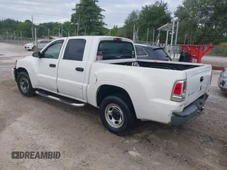 2007 Mitsubishi Raider LS z VIN 1Z7HC28K37S161604, wystawiony jako IAAI lot #42419553 z przebiegiem 297 632 mil mil oraz . Historia ofert i sprzedaży dostępna na DreamBid. Obrazek 3.