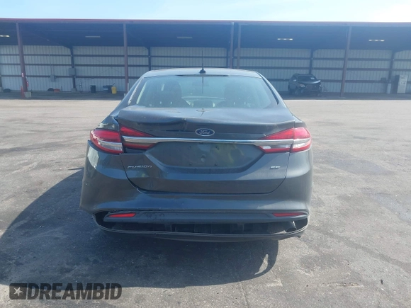 2017 Ford Fusion SE z VIN 3FA6P0H76HR259097, wystawiony jako IAAI lot #42133090 z przebiegiem 187 400 mil mil oraz . Historia ofert i sprzedaży dostępna na DreamBid. Obrazek 16.