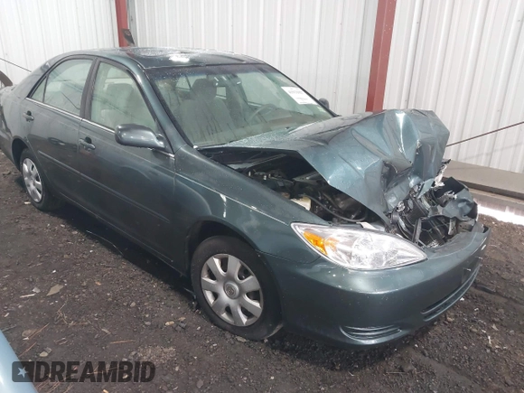 2004 Toyota Camry LE with VIN 4T1BE30K54U377818, listed as a IAAI auction lot 41931027 with 212,690 mi miles. Bid and sale history available at carsss.com. Image 1.
