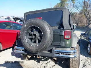 2010 Jeep Wrangler Sport with VIN 1J4AA2D16AL212492, listed as a IAAI auction lot 41656955 with 225,718 mi miles and . Bid and sale history available at carsss.com. Image 15.