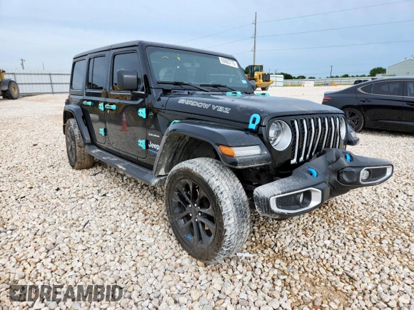 2022 Jeep Wrangler Unlimited Sahara with VIN 1C4JJXP61NW170425, listed as a Copart auction lot 60683715 with 51,847 mi miles and Salvage title. Bid and sale history available at DreamBid. Image 4.
