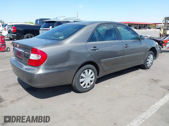 2004 Toyota Camry LE with VIN 4T1BE32K44U825561, listed as a IAAI auction lot 42051914 with 244,521 mi miles and . Bid and sale history available at DreamBid. Image 3.