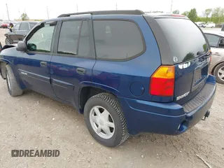 2003 GMC Envoy SLT z VIN 1GKDS13S532309264, wystawiony jako IAAI lot #42200597 z przebiegiem 86 728 mil mil oraz . Historia ofert i sprzedaży dostępna na DreamBid. Obrazek 3.