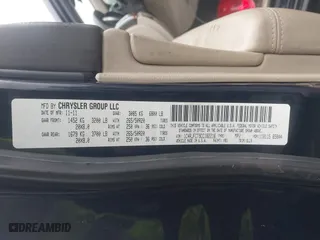 2012 Jeep Grand Cherokee Overland with VIN 1C4RJFCT9CC182216, listed as a IAAI auction lot 41490446 with 153,237 mi miles. Bid and sale history available at carsss.com. Image 9.