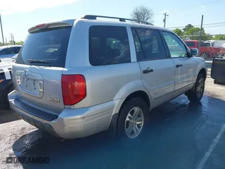 2004 Honda Pilot EX with VIN 2HKYF18594H519175, listed as a IAAI auction lot 41899345 with 268,718 mi miles. Bid and sale history available at carsss.com. Image 4.