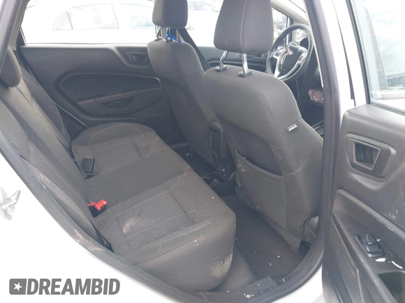 2019 Ford Fiesta SE z VIN 3FADP4EJ5KM132862, wystawiony jako IAAI lot #40893430 z przebiegiem 91 011 mil mil oraz . Historia ofert i sprzedaży dostępna na DreamBid. Obrazek 8.