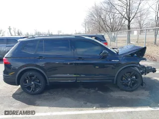 2023 Volkswagen Tiguan SE R-Line Black with VIN 3VVCB7AXXPM094621, listed as a IAAI auction lot 41737103 with 21,069 mi miles. Bid and sale history available at carsss.com. Image 13.