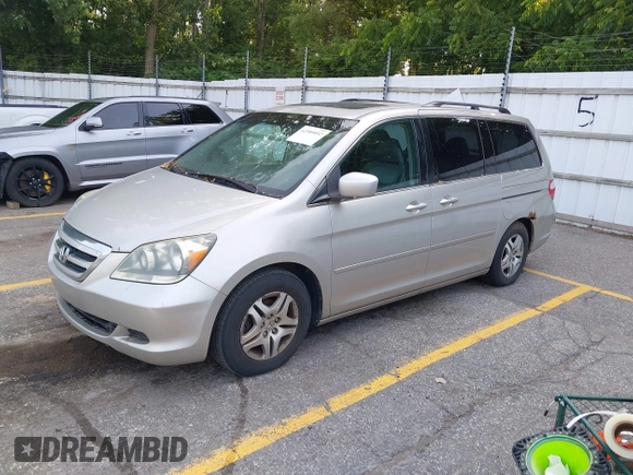 2005 Honda Odyssey EX-L with VIN 5FNRL38715B003399, listed as a IAAI auction lot 42589092 with 252,737 mi miles and . Bid and sale history available at DreamBid. Image 2.