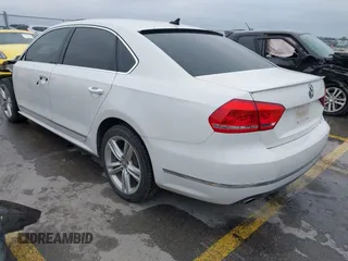 2014 Volkswagen Passat TDI SEL Premium with VIN 1VWCN7A32EC035738, listed as a IAAI auction lot 41641843 with 151,159 mi miles. Bid and sale history available at carsss.com. Image 3.