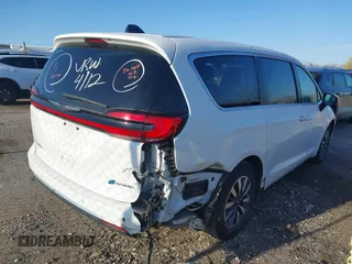 2023 Chrysler Pacifica Hybrid Touring L z VIN 2C4RC1L74PR562240, wystawiony jako IAAI lot #42060669 z przebiegiem 45 882 mil mil oraz . Historia ofert i sprzedaży dostępna na DreamBid. Obrazek 4.