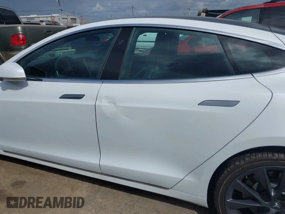 2018 Tesla Model S 75D with VIN 5YJSA1E23JF271465, listed as a IAAI auction lot 41911356 with 50,483 mi miles and . Bid and sale history available at DreamBid. Image 14.
