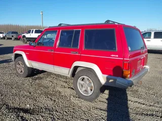 1996 Jeep Cherokee Country with VIN 1J4FJ78S1TL245327, listed as a IAAI auction lot 41443781 with 245,889 mi miles. Bid and sale history available at carsss.com. Image 3.