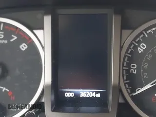 2021 Toyota Tacoma SR z VIN 5TFCZ5AN5MX281428, wystawiony jako IAAI lot #41893437 z przebiegiem 36 204 mil mil oraz . Historia ofert i sprzedaży dostępna na DreamBid. Obrazek 15.