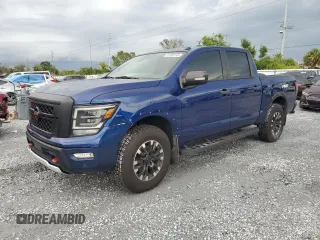 2020 Nissan Titan SL with VIN 1N6AA1ED4LN506728, listed as a Copart auction lot 61565745 with 77,526 mi miles and Salvage title. Bid and sale history available at DreamBid. Image 1.
