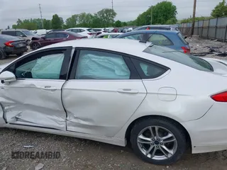 2016 Ford Fusion SE Hybrid with VIN 3FA6P0LU7GR356479, listed as a IAAI auction lot 42252046 with 119,046 mi miles and . Bid and sale history available at DreamBid. Image 14.