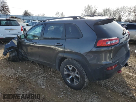 2014 Jeep Cherokee Trailhawk with VIN 1C4PJMBS5EW160669, listed as a Copart auction lot 82000703 with Not provided miles and Salvage title. Bid and sale history available at DreamBid. Image 2.
