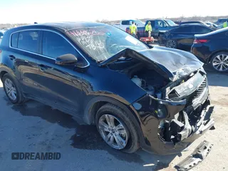 2019 Kia Sportage LX with VIN KNDPM3AC4K7534271, listed as a IAAI auction lot 41696261 with 71,386 mi miles. Bid and sale history available at carsss.com. Image 1.