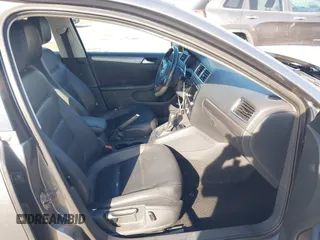 2013 Volkswagen Jetta TDI w/Premium z VIN 3VWLL7AJ6DM291317, wystawiony jako IAAI lot #42091621 z przebiegiem 169 448 mil mil oraz . Historia ofert i sprzedaży dostępna na DreamBid. Obrazek 5.