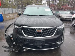 2022 Cadillac XT6 Premium Luxury z VIN 1GYKPDRS8NZ161368, wystawiony jako IAAI lot #41115620 z przebiegiem 140 819 mil mil oraz . Historia ofert i sprzedaży dostępna na DreamBid. Obrazek 12.