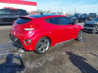 2013 Hyundai Veloster Turbo z VIN KMHTC6AE3DU169229, wystawiony jako IAAI lot #42087798 z przebiegiem 120 741 mil mil oraz . Historia ofert i sprzedaży dostępna na DreamBid. Obrazek 4.
