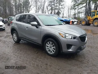 2014 Mazda CX-5 Sport with VIN JM3KE4BE5E0377397, listed as a IAAI auction lot 41570205 with 131,474 mi miles. Bid and sale history available at carsss.com. Image 1.