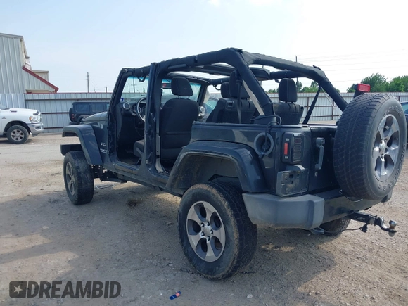 2016 Jeep Wrangler Unlimited Sahara with VIN 1C4BJWEG8GL333876, listed as a IAAI auction lot 42314351 with 163,889 mi miles and . Bid and sale history available at DreamBid. Image 3.