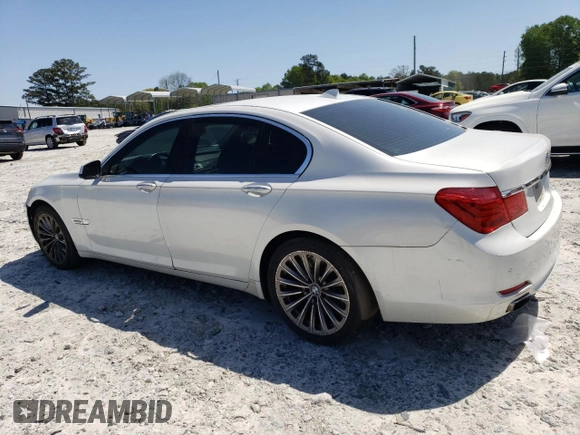 2011 BMW 7 Series 750i with VIN WBAKA8C57BCY36883, listed as a Copart auction lot 52237295 with 185,133 mi miles and Clean title. Bid and sale history available at DreamBid. Image 2.