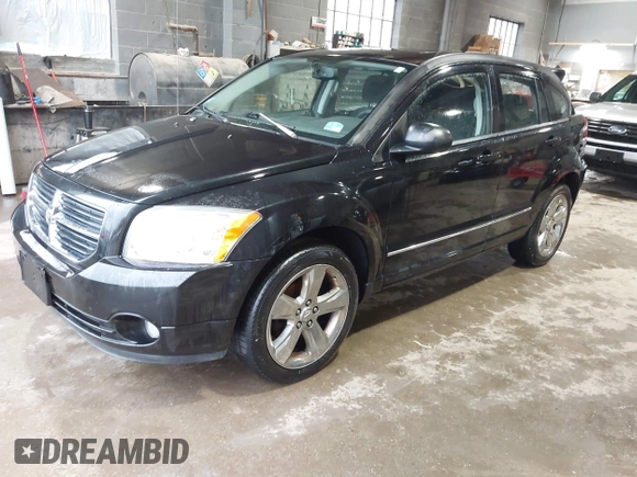 2011 Dodge Caliber Rush with VIN 1B3CB8HB5BD108767, listed as a IAAI auction lot 41820107 with 145,101 mi miles. Bid and sale history available at carsss.com. Image 2.