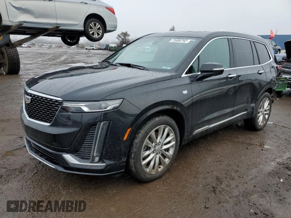 2021 Cadillac XT6 Premium Luxury z VIN 1GYKPDRS8MZ103159, wystawiony jako Copart lot #73400792 z przebiegiem 54 365 mil mil oraz . Historia ofert i sprzedaży dostępna na DreamBid. Obrazek 1.