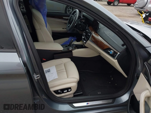 2019 BMW 5 Series M550i xDrive with VIN WBAJB9C57KB289439, listed as a IAAI auction lot 40634389 with 85,992 mi miles and . Bid and sale history available at DreamBid. Image 5.