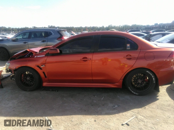 2010 Mitsubishi Lancer Evolution GSR with VIN JA32W8FV7AU003558, listed as a IAAI auction lot 40856259 with 123,639 mi miles and . Bid and sale history available at DreamBid. Image 15.