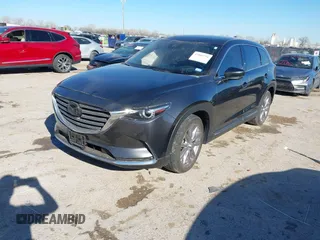 2023 Mazda CX-9 Carbon Edition z VIN JM3TCBDY2P0633889, wystawiony jako IAAI lot #41804791 z przebiegiem 20 454 mil mil oraz . Historia ofert i sprzedaży dostępna na DreamBid. Obrazek 17.