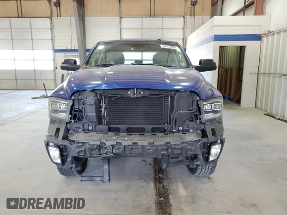 2014 Ram 1500 Express with VIN 3C6RR7KT4EG324804, listed as a Copart auction lot 58233005 with 103,306 mi miles and Salvage title. Bid and sale history available at DreamBid. Image 5.