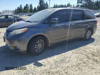 2015 Toyota Sienna XLE with VIN 5TDYK3DC7FS630252, listed as a Copart auction lot 65182965 with 90,764 mi miles and Salvage title. Bid and sale history available at DreamBid. Image 1.