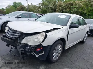 2010 Chrysler Sebring Touring with VIN 1C3CC4FB5AN229593, listed as a IAAI auction lot 41971326 with 144,561 mi miles and . Bid and sale history available at DreamBid. Image 2.