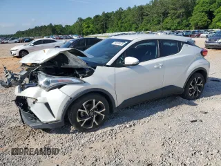 2018 Toyota C-HR XLE z VIN NMTKHMBX7JR049678, wystawiony jako Copart lot #54520075 z przebiegiem 142 865 mil mil oraz Szkoda całkowita • Salvage title. Historia ofert i sprzedaży dostępna na DreamBid. Obrazek 1.