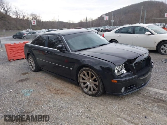 2006 Chrysler 300 C SRT8 with VIN 2C3KA73W06H239927, listed as a IAAI auction lot 41837066 with 169,260 mi miles. Bid and sale history available at carsss.com. Image 1.