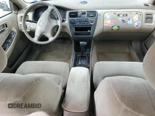2000 Honda Accord SE with VIN 1HGCG5677YA049486, listed as a Copart auction lot 58548565 with 267,067 mi miles and Salvage title. Bid and sale history available at DreamBid. Image 8.