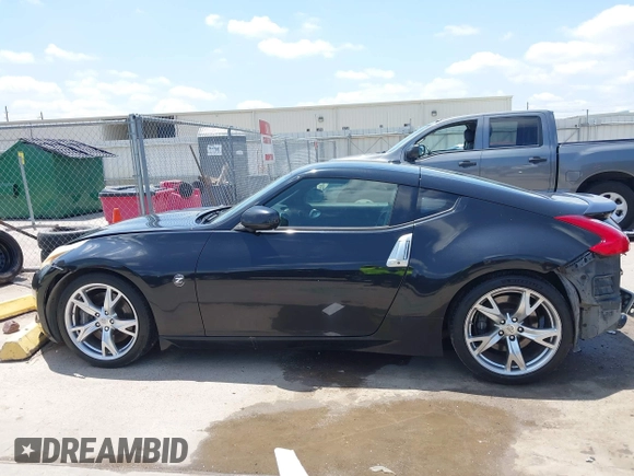 2012 Nissan 370Z z VIN JN1AZ4EH1CM564630, wystawiony jako IAAI lot #42177880 z przebiegiem 173 751 mil mil oraz . Historia ofert i sprzedaży dostępna na DreamBid. Obrazek 15.