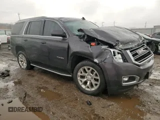 2015 GMC Yukon SLT with VIN 1GKS2BKC1FR732961, listed as a Copart auction lot 49898945 with 0 mi miles and Salvage Title. Bid and sale history available at carsss.com. Image 4.