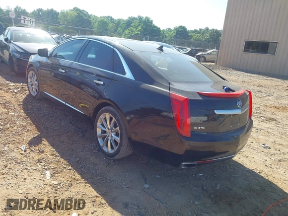 2014 Cadillac XTS Luxury with VIN 2G61M5S30E9229758, listed as a IAAI auction lot 42179952 with 125,848 mi miles and . Bid and sale history available at DreamBid. Image 3.