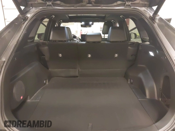 2023 Toyota RAV4 Hybrid XSE with VIN 4T3E6RFV7PU124140, listed as a IAAI auction lot 42201073 with 50,942 mi miles and . Bid and sale history available at DreamBid. Image 17.