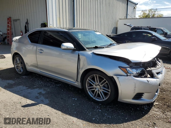 2011 Scion tC with VIN JTKJF5C74B3010047, listed as a Copart auction lot 47317555 with 125,659 mi miles and Salvage Title. Bid and sale history available at carsss.com. Image 4.