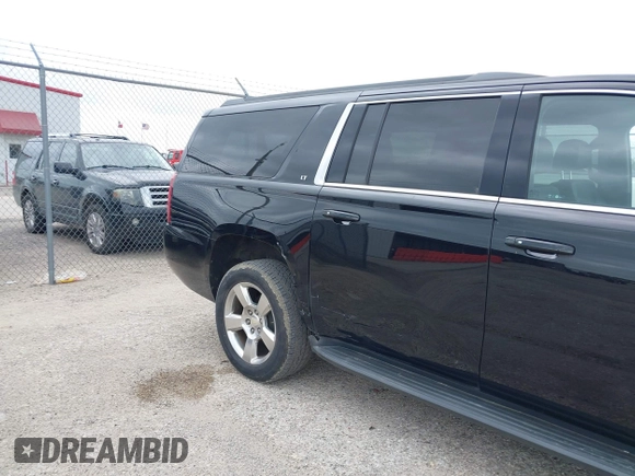 2016 Chevrolet Suburban LT with VIN 1GNSKHKC4GR233059, listed as a IAAI auction lot 42137869 with 115,571 mi miles. Bid and sale history available at carsss.com. Image 6.