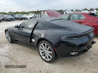 2021 Aston Martin DB11 V8 z VIN SCFRMFAW6MGL10668, wystawiony jako Copart lot #79014154 z przebiegiem Nie podano mil oraz Szkody całkowita. Historia ofert i sprzedaży dostępna na DreamBid. Obrazek 2.