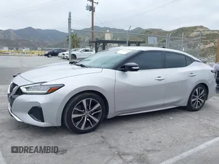 2020 Nissan Maxima SV with VIN 1N4AA6CVXLC380646, listed as a IAAI auction lot 42041422 with 99,579 mi miles and . Bid and sale history available at DreamBid. Image 14.