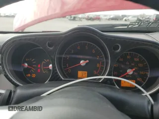 2007 Nissan 350Z Touring z VIN JN1BZ36A87M653584, wystawiony jako Copart lot #85269194 z przebiegiem 57 030 mil mil oraz Szkoda całkowita • Salvage title. Historia ofert i sprzedaży dostępna na DreamBid. Obrazek 9.