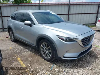 2018 Mazda CX-9 Grand Touring with VIN JM3TCADY7J0233392, listed as a IAAI auction lot 42465757 with 85,147 mi miles and . Bid and sale history available at DreamBid. Image 1.