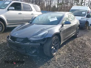 2023 Tesla Model 3 with VIN 5YJ3E1EAXPF666252, listed as a IAAI auction lot 42009929 with 27,328 mi miles and . Bid and sale history available at DreamBid. Image 21.